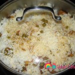 Add the water slowly so the rice doesn't get displaced, and cook on medium low till the water is absorbed.