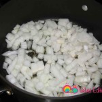 Add the chopped onions to the vegetable oil.