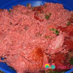 Add the tomato paste, seasonings and ground beef.